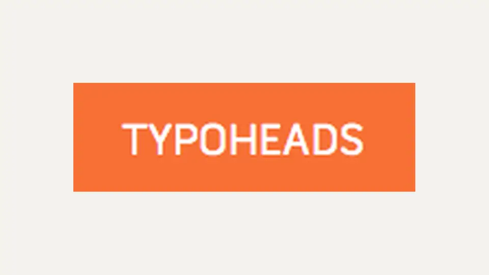 TYPOHEADS in Weiß auf orangem Feld
